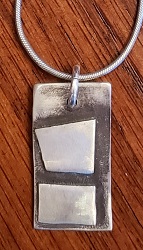 abstract sterling silver pendant handcrafted in the USA